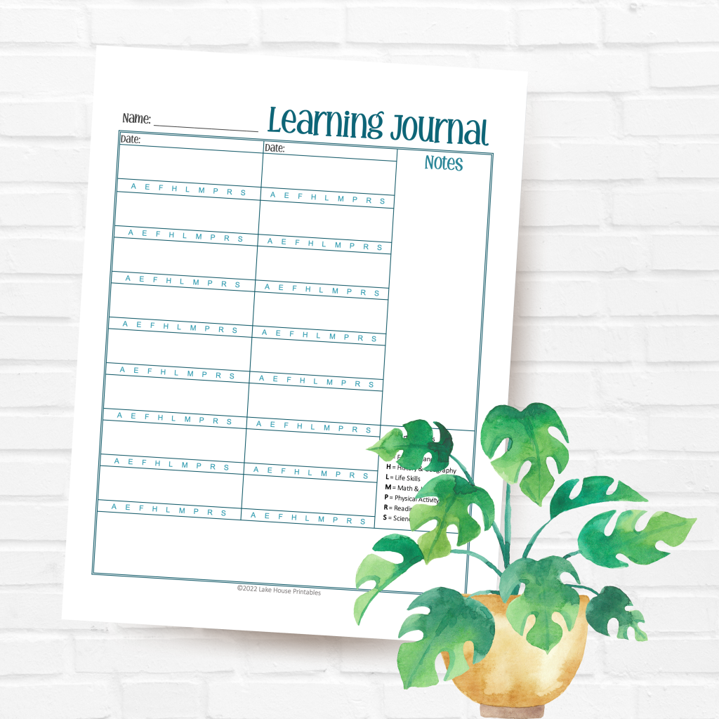 A picture of my printable learning journal for homeschool parents on a white brick background with a cute watercolor plant.